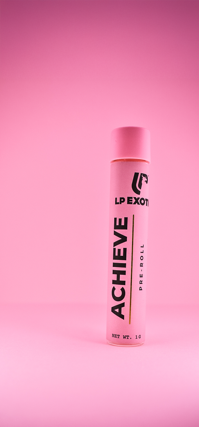 Single pink LP Achieve pre-roll tube in a pink studio